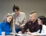 Uniwersytety WSB Merito na Impact26 | Aktualności | Uniwersytet WSB Merito Bydgoszcz: czwórka studentów omawiających projekt