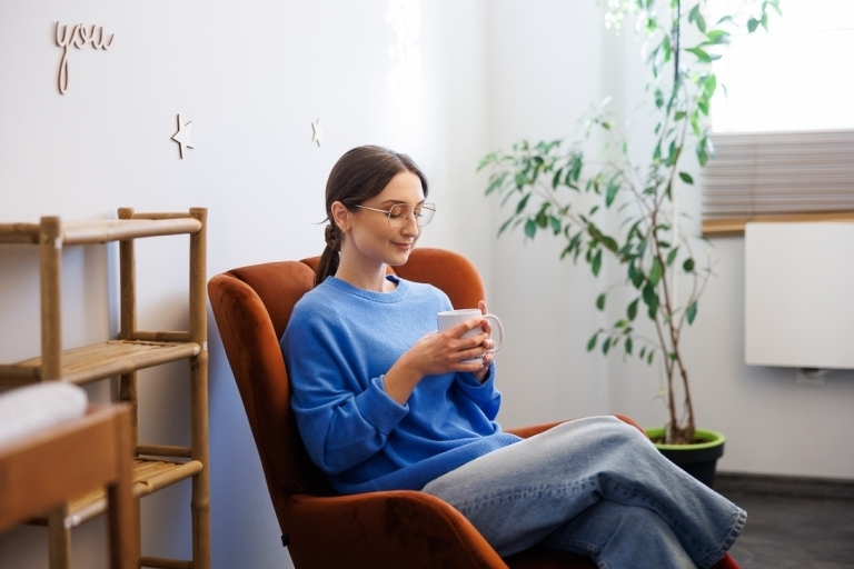 Our campus | WSB Merito Opole University: A student sitting in a chair