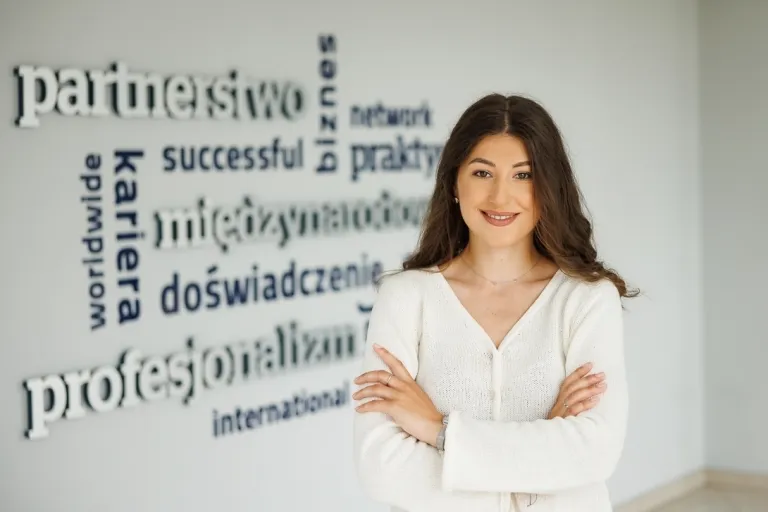 Academic publications | WSB Merito Toruń University: A female student with hands crossed