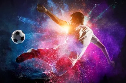 Aktualności | Uniwersytet WSB Merito w Gdańsku: Piłkarz w trakcie skoku i w kolorowym proszku