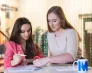 Uniwersytety WSB Merito na Impact26 | Aktualności | Uniwersytet WSB Merito w Toruniu: dwie osoby rozmawiają ze sobą